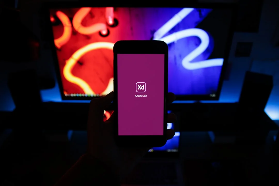 Businesswoman working on laptop with Android 6.0 Marshmallow webpage open.